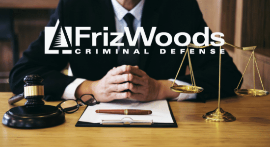 FrizWoods text over man with hands folded